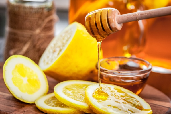 hot tea with lemon and natural honey good treat to have vitamins and strong immunity - Монастырская кухня: грибные вареники, овсяный кисель