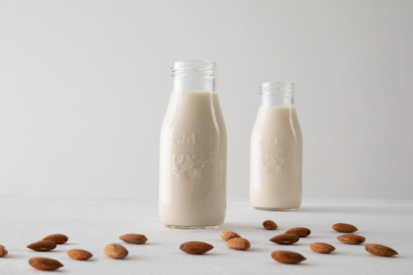 milk bottles and almonds arrangement - Овсянка с какао без варки