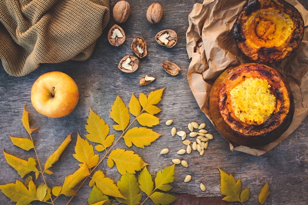 millet porridge baked in pumpkin walnut seeds apple yellow leaves warm sweater toned image top view 1 - Монастырская кухня: пшённая каша в тыкве, постное печенье на рассоле