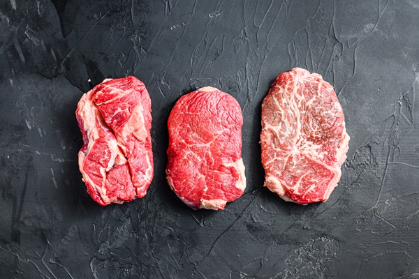 set of raw alternative cuts beef steaks - Ромштекс