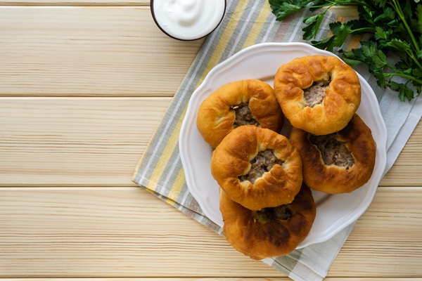 traditional tatar and bashkir dish belyashi open fried pies with minced meat and onions 1 - Беляши