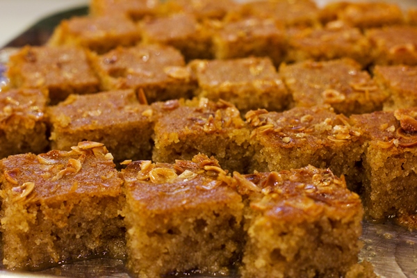 traditional turkish dessert revani in sweet sugar syrup with nuts - Монастырская кухня: рис с баклажанами, ревани