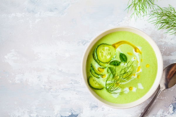 vegan cold cucumber cream soup in white bowl on a gray 1 - Постный огуречный суп без варки