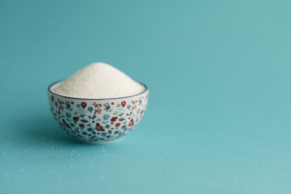 bowl of sugar on a light blue surface - Пасхальная мона