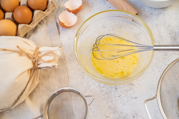 top view kitchen supplies with pasta ingredients - Суфле манное на молоке, паровое