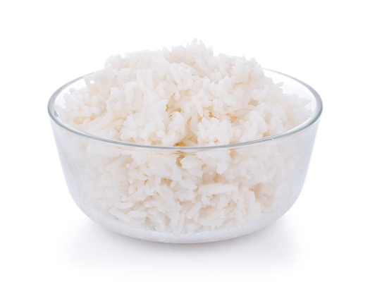 rice in a bowl on a white background - Постные ленивые голубцы с грибами и рисом