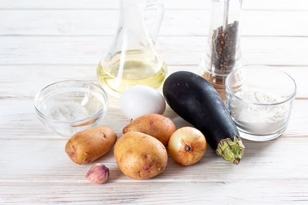 ingredients for cooking eggplant cutlets healthy veggie recipe closeup - Драники из картофеля и баклажанов