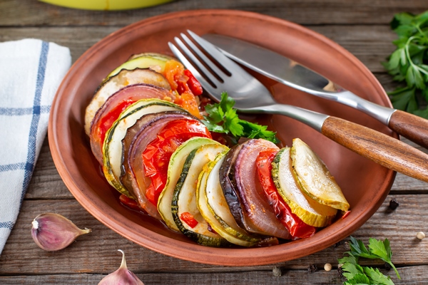 ratatouille is a french provencal vegetable dish cooked in the oven diet vegetarian food ratatouille casserole - Рататуй под соусом пепперад, постный стол