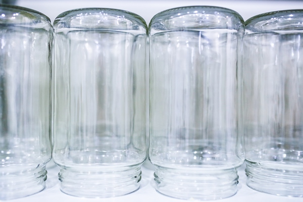 upside down sterilized glass jars prepared for food conservation process - Острая закуска из кабачков "Тёщин язык"