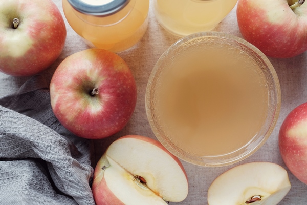 apple cider vinegar with mother in glass bowl probiotics food for gut health - Луковый взвар