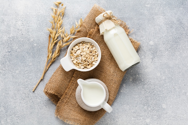 homemade diet vegetable milk made from oatmeal on a gray diet healthy concept copy space and banner - Постный тыквенный смузи