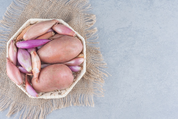 bowl of organic fresh vegetables potatoes and red oninons - Драники постные с кукурузной крупой