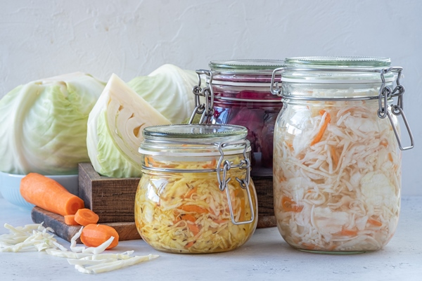 fermented preserved vegetarian food concept cabbage sauerkraut sour glass jars - Консервирование пищевых продуктов