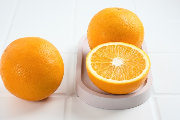 fresh and ripe sunkist oranges fruits close up selected focus - Драники с апельсиново-клюквенным соусом
