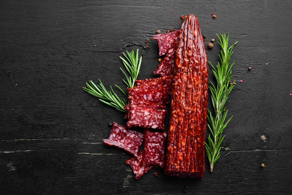 dry salted pork and veal salami square in shape top view free space for your - Походная каша с колбасой и овощами