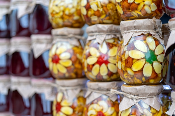 multicolored fruit and berry jam in glass jars - Мёд с орехами