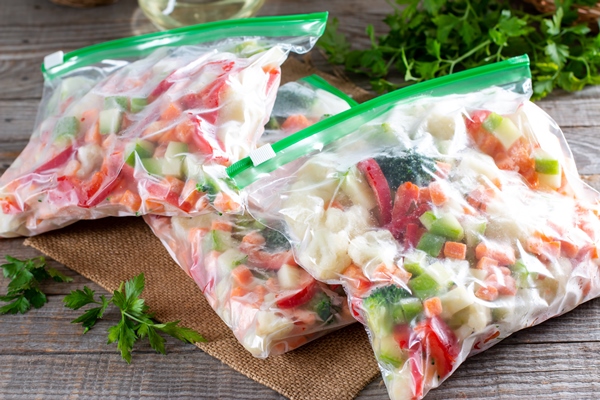 frozen vegetables in plastic bags on a table frozen food - Замороженные овощи для супа и вторых блюд