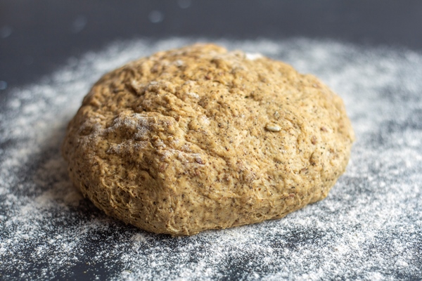 rye flour dough with various seeds and grains for baking grain bread - Постная пицца на пресном тесте