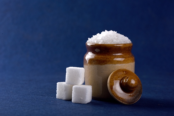 sugar white granulated sugar and refined sugar on a blue - Пицца "Четыре сыра"