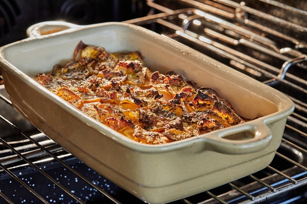 potato and sweet potato gratin with provence herbs is baked in the oven french gourmet cuisine - Картофель, запечённый с лососем