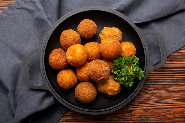 top view delicious food croquettes - Картофельные крокеты, постный стол