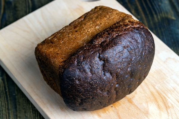 rectangular loaf of rye flour bread - Ржаной обдирной хлеб