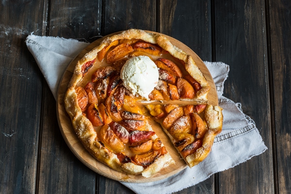 apricot galette process of baking open pie apricot tart fruit bakery ice cream with w - Постная абрикосовая галета