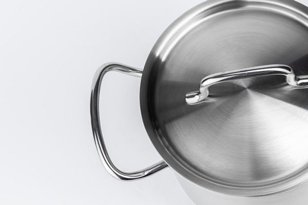 new metal cooking pot isolated on white - Клубничная галета, постный стол