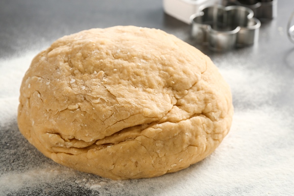 prepared dough for butter cookies on kitchen table - Постная абрикосовая галета