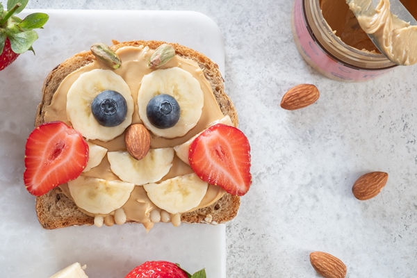 kids breakfast toast with peanut butter spread banana strawberry - Тосты для детей на завтрак