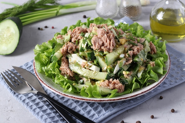 salad with canned tuna green onions eggs and cucumber seasoned with olive oil - Салат с консервированным тунцом, яйцом, зелёным луком и огурцом