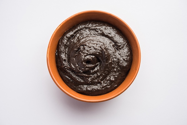 chyawanprash or chyavanprash is an indian ayurvedic immunity booster health supplement made up of a concentrated blend of minerals and nutrient rich herbs served in a bowl isolated - Финиковый латте