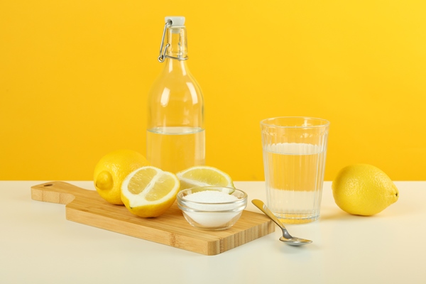 composition with household cleaners on white table against yellow background - Икра баклажанная (школьное питание)