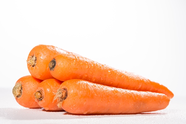 fresh carrots on white background - Овощная икра (школьное питание)