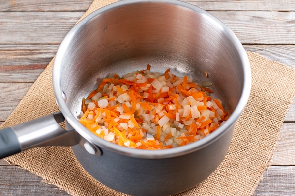 onions and carrots in a saucepan for making lentil soup step by step healthy food 1 - Суп картофельный с клёцками (школьное питание)