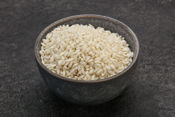 raw arborio rice for risotto - Плов из морского гребешка