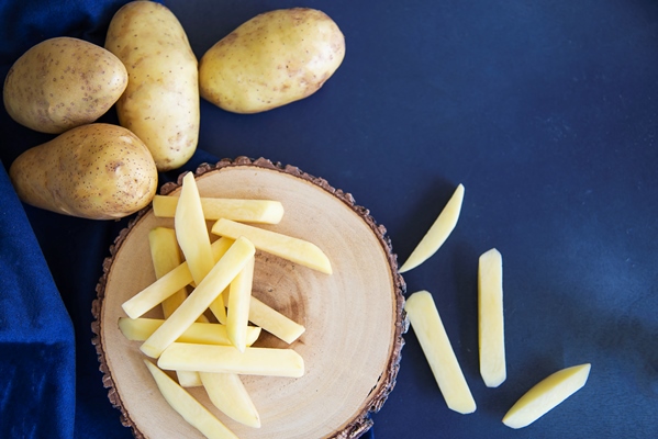 sliced potato stick ready for making french fries traditional food preparation concept 2 - Суп крестьянский с рисом (школьное питание)