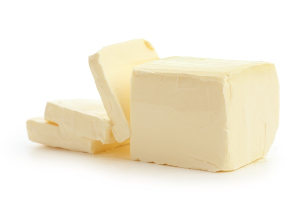 tasty fresh butter on white background - Каша "Дружба" (школьное питание)