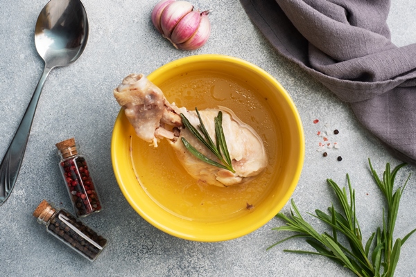 chicken broth and boiled chicken drumstick in a bowl - Соус красный основной (школьное питание)