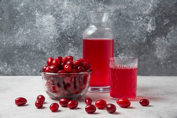 cornels with juice in the glass and jar - Соус клюквенный (школьное питание)