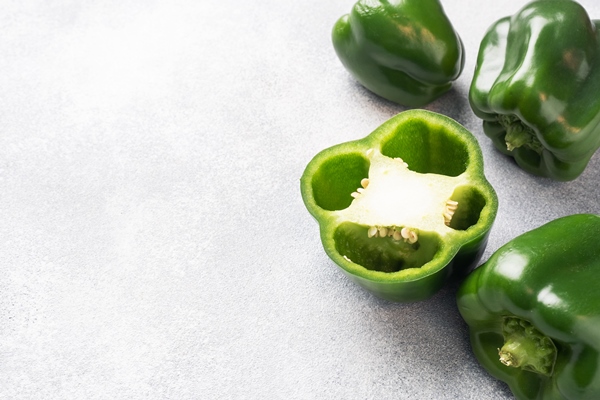 fresh sweet green pepper on a grey concrete - Филе сёмги в соусе из сладкого перца