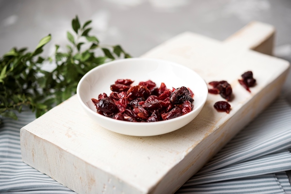 high view dried fruit on wooden board with blurred background - Морковный торт
