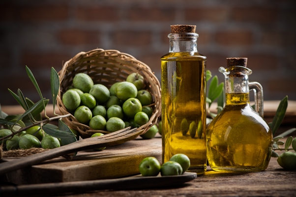 olives and olive oil in a bottles close up - Бефстроганов из отварной говядины (школьное питание)