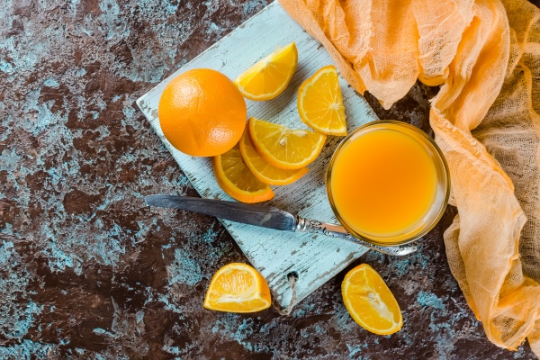 orange juice in a glass and pieces - Кисель из апельсинов (школьное питание)