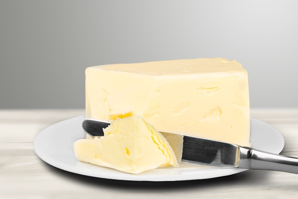 pat of fresh farm butter on a 2 - Рыбная котлета из трески (школьное питание)