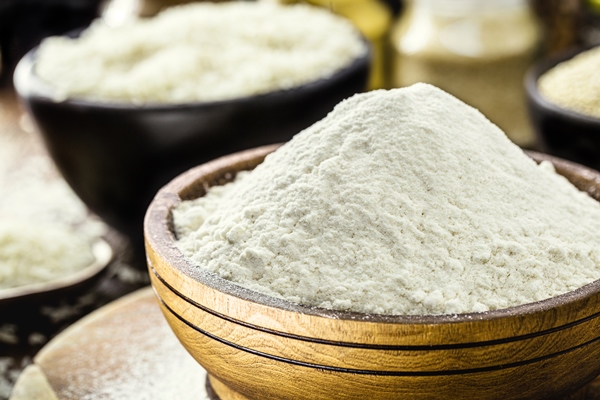 rice flour in a blown style wooden pot gluten free and wholemeal ingredient - Соус красный основной (школьное питание)