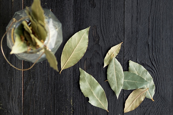 top view dry leaves on wooden background 1 - Соус красный основной (школьное питание)