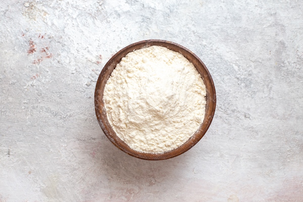 top view white flour inside plate on white background flour dust dough bake raw - Шупфнудель (картофельные пальчики)