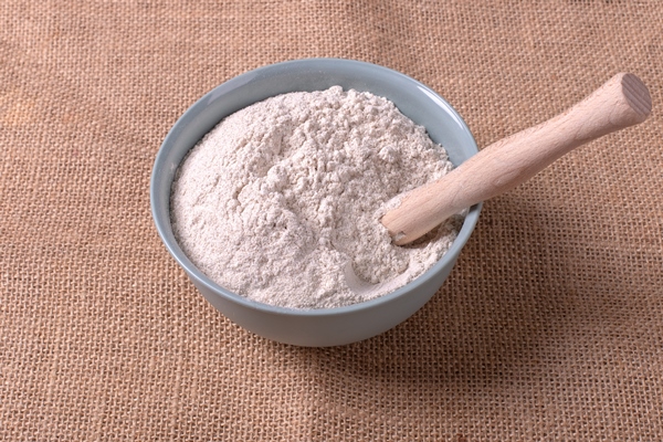 a bowl of flour on tablecloth - Пирог из капусты в мультиварке