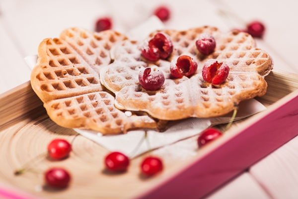 close up sweet waffles with cherry - Вафли на сметане